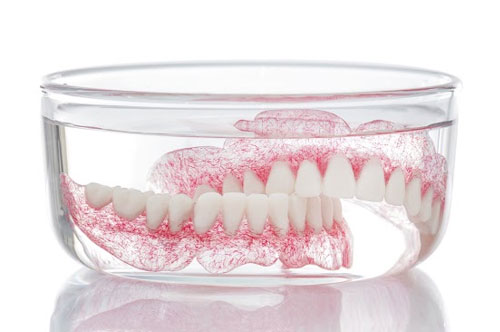Ditch Slippery Dentures & Explore Dental Implant Options! [VIDEO]